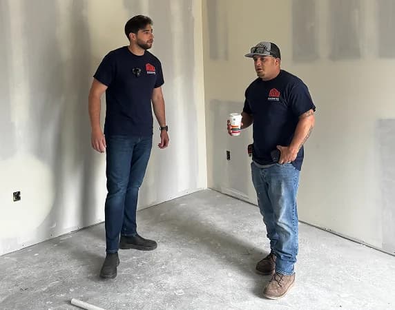 ADU San Mateo team members reviewing a build in progress